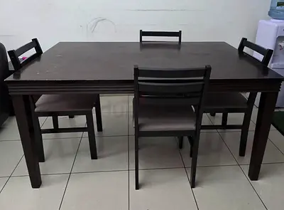 Dark wood 4-seat dining table with chairs - good used condition