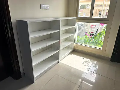 IKEA Billy-style white bookcase pair - good condition