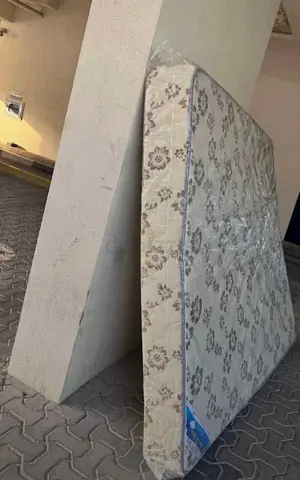 Single mattress in good condition (firm, floral cover)
