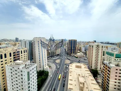 ✨ Spacious 2BHK with Covered Parking, Laundry Room & 3 Washrooms | Prime Roadside Building in Al Mujarrah ✨