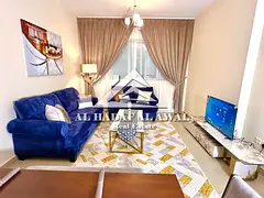 One bedroom and living room, Al Taawun Houses 3, on Dubai Exit 4000 with internet