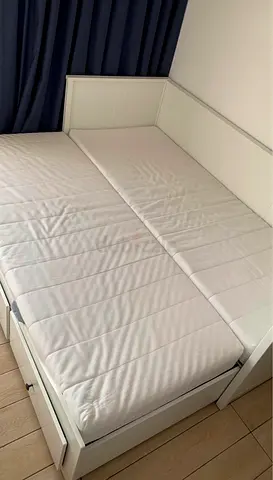 IKEA Hamnes Day bed with 3 storage drawers underneath and with 2 IKEA mattresses