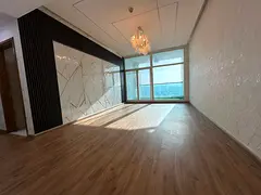 3 bedrooms and a living room, maid's room, 5 bathrooms, all bedrooms are master suites, laundry 