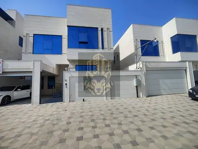 Villa for rent in Al Yasmeen, 6 master beds, majlis, hall, maid & roof, 3014 sq.ft, central AC, AED 130,000 in 4 payments