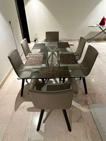 Glass Top Dining table only. West elm