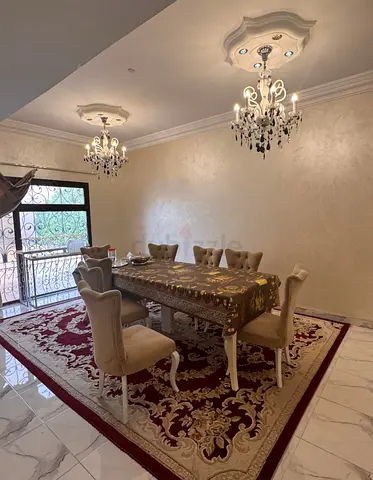 Classic 8-Seater Dining Table with Upholstered Chairs and Large Rug