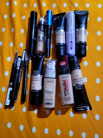 Bundle of LOreal  assorted liquid foundations, concealers and eyeliners - mixed shades