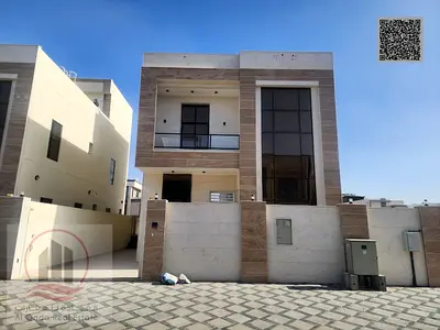 Villa for sale in Ajman, Al Yasmin area. It consists of 7 master bedrooms, a majlis, a living room, a maid's room, and a roof terrace. Suitable for al