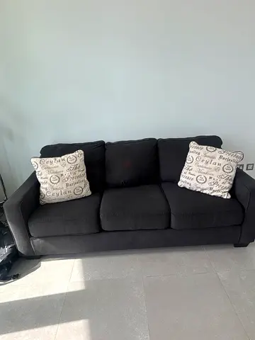 Dark gray 3-seater sofa in good condition with cushions