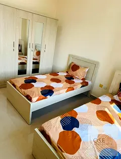 Own and invest in a two-bedroom apartment in Al Na'amiyah Towers at a bargain price.