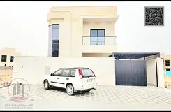 Villa for sale in Ajman, Al Zahia area. It consists of 5 master bedrooms, a majlis (formal sitting r
