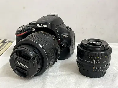Nikon D5100 + 18-55 lens + 50mm 1.8d lens