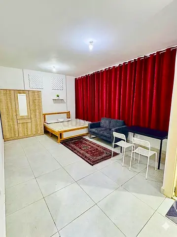 Newly furnished spacious Master bedroom available in Hamdan-Al hisn,landmark for couples and ladies