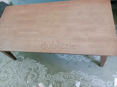 Simple wooden coffee table - solid top, good for living room