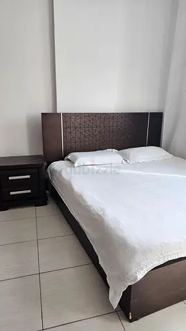 King size bed and matching mirror  dresser and beside table