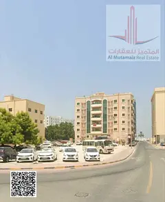 Land for sale in Ajman, Al Nakheel 2, corner plot on two streets, area 8,800 sq ft, residential/comm