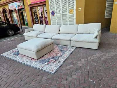 Home Center swin feather filled sofa with footstool