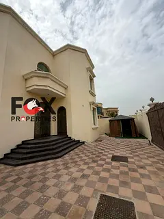 Villa for rent in Al Raqaib Ajman 5 bedrooms majlis hall maid room laundry room large yard prime loc