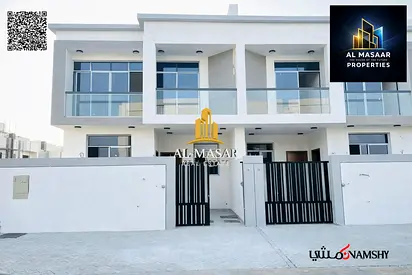 Townhouse in Al Bahia, Ajman, two floors and a roof, central air conditioning, 6 master bedrooms, freehold ownership for all nationalities