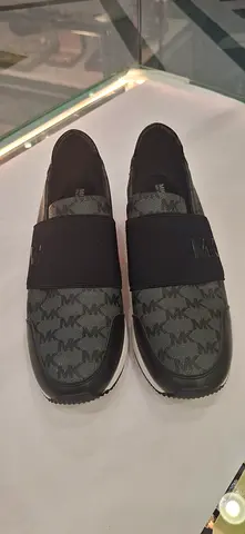 Michael Kors slip-on womens casual sneakers, size unknown, lightly used