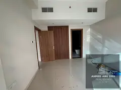 Two bedrooms and a living room with an open sea view for rent in Rashidiya 1, near Gulf Bridge, Nest