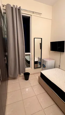 Available soundproof new single partition with smart tv and fridge in sports city