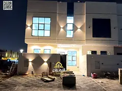 Luxury villa for sale in Al Bahia area, featuring two floors and a rooftop terrace. Modern design, s