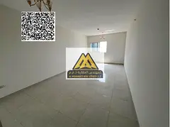 A 2-bedroom apartment for annual rent in a prime location near the Corniche. It features an open vie