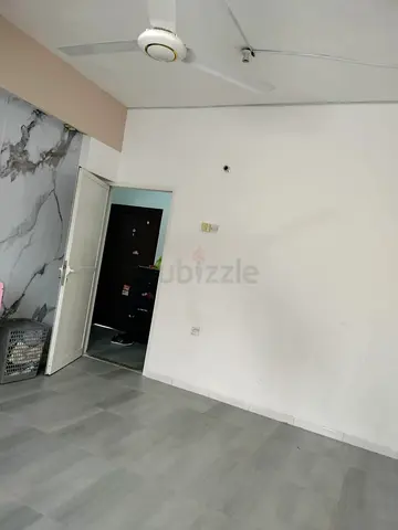 Family Sharing Room in Villa at satwa