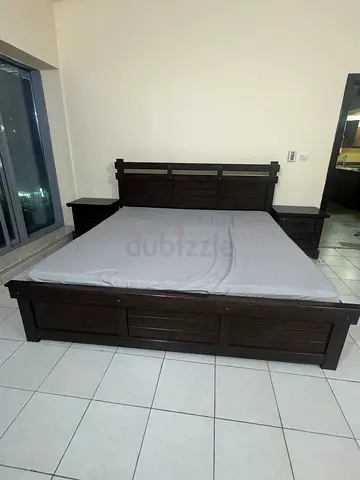 Solid Dark Wood Double Bed Frame with side tables, dresser mirror an cheset drawers