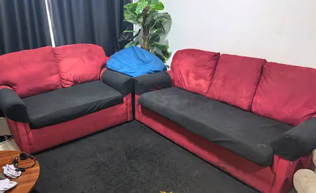 Used red fabric 3-seater and 2-seater sofa set — comfortable, 500 DHS