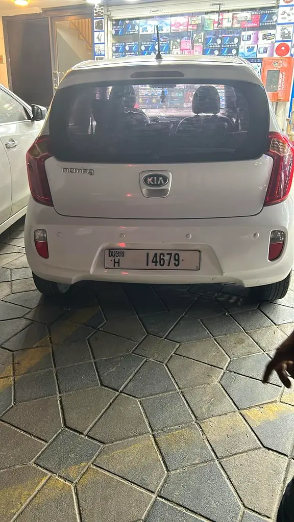 Kia Morning 2014 — photo 1 of 4