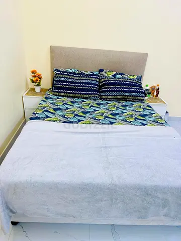 Double bed with headboard and matching side tables - good condition