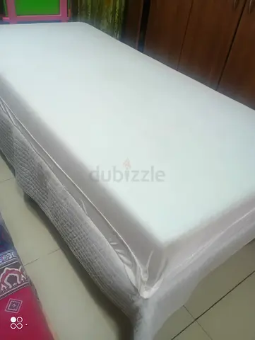 Metal bed frame with mattress