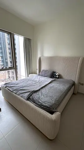 Modern upholstered king-size bed with padded headboard — beige/cream plus matrasse as well