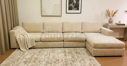 Eterno model home center beige color four seater lshape sofa