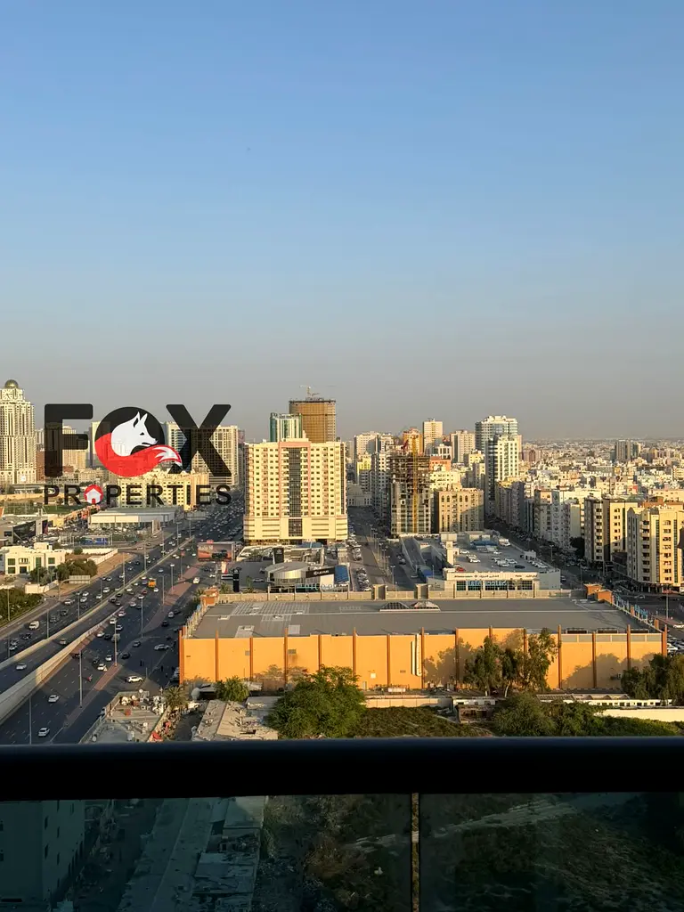 Apartment with a living room for sale in Al-Rashidiya 3, in City Tower Towers, with furnishings, 2 bathrooms, a balcony, and a private parking.