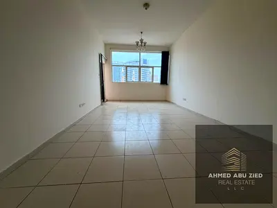 One bedroom and living room in Ajman One Towers, Al Rashidiya 3, balcony with open view, American kitchen, wardrobes, 2 bathrooms, free parking, 38,00