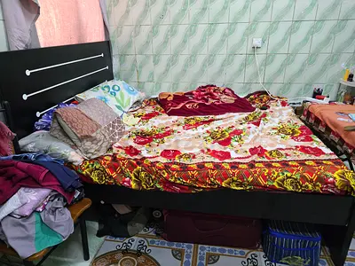 Queen size bed frame with mattress and bedding (used)