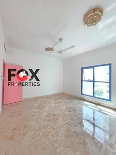 3-bedroom apartment for annual rent in Al Nuaimia Towers, central AC, 3 bathrooms, balcony, 60,000 A