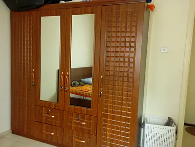 Wooden 4-Door Wardrobe with Mirrors and Drawers - Good Condition