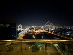 1 month free—annual rent, unfurnished 2BR + hall in Conquer Tower on Khalifa St; 2 balconies, grea