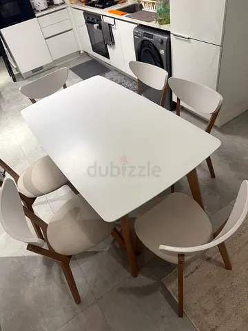 White Modern 6-Seater Dining Table with Wooden Legs and Chairs