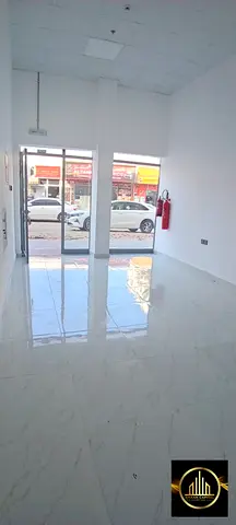 Spacious commercial shops for annual rent in Al Karama, prime location near the Corniche and Palm Trees. 60,000 (currency unspecified) payable in 4 in