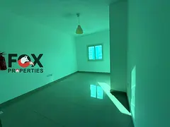 For annual rent, a distinctive studio with a large area in Al Rashidiya 3, Ajman, excellent location