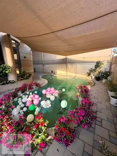 Villa for sale in Sharjah Emirate, Al-Serqan area, two floors, swimming pool and outdoor seating, pr