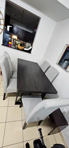 Dark Wood Dining Table with 5 Upholstered Chairs - Good Condition