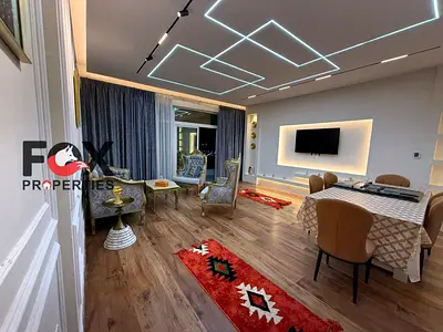 Largest furnished 2-bedroom apartment for sale in Horizon Towers, with parking, custom finishing, balcony, prime strategic location.