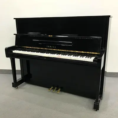 Yamaha U1 Upright Piano. Japan made with new piano bench. Well balanced keys and Hammers and pedals