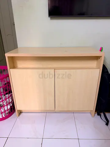 Wooden table with locker